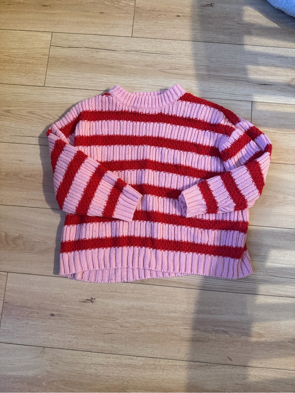 pink and red striped sweater